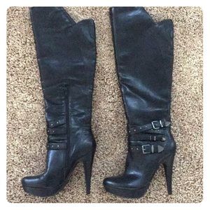 Knee high leather high heel boots